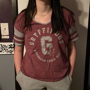 Harry Potter Gryffindor t-shirt, size small. Model is 5'8", weights 155lbs